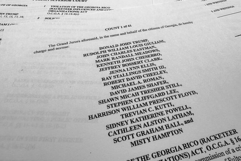 The indictment in Georgia against former President Donald Trump. Photograph: Jon Elswick/AP Photo