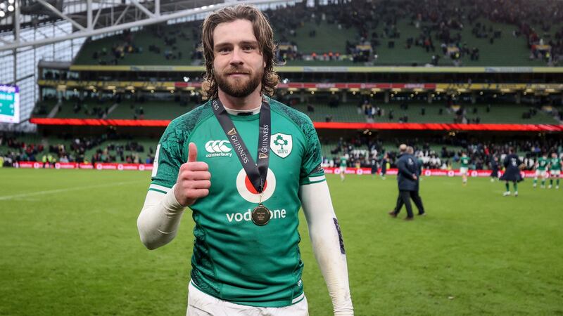 Ireland’s Mack Hansen is presented with the Guinness Six Nations Player of the Match award at the Aviva Stadium on Saturday. Photograph: Dan Sheridan/Inpho