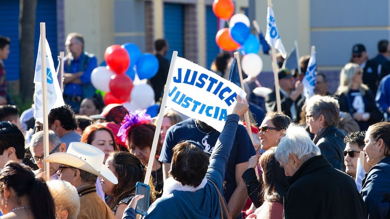 Supporters hold signs aloft Julian Castro announces his candidacy. Photograph: AFP/Getty Images