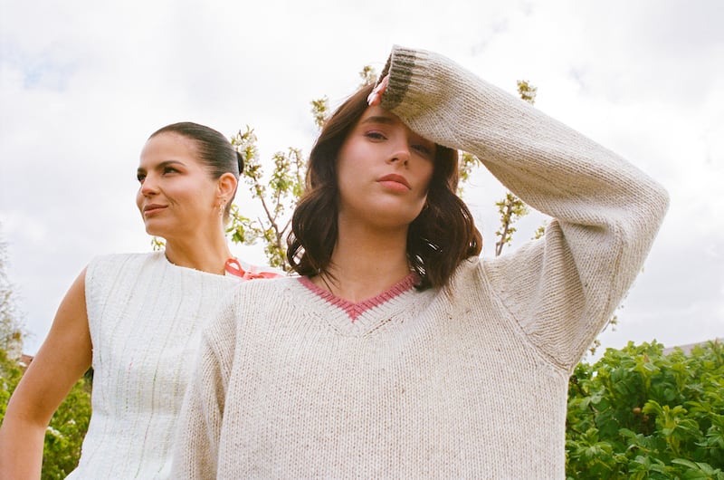 Left, linen wildflower waistcoat €185, right, cream jumper €150