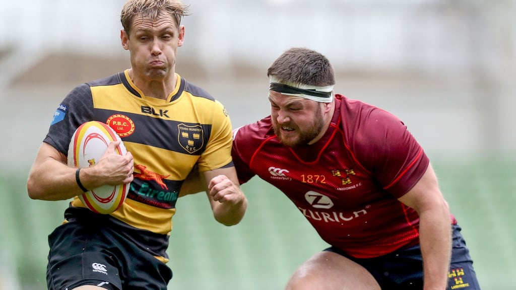 Young Munster’s Craig O’Hanlon is tackled by Lansdowne’s Tyrone Moran during the Ulster Bank League Division 1A match at the  Aviva Stadium. Photograph: Oisín Keniry/Inpho