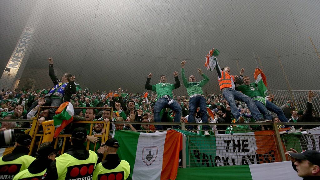 Ireland fans celebrate Robbie Brady’s goal in Zenica. Photograph: Donall Farmer/Inpho