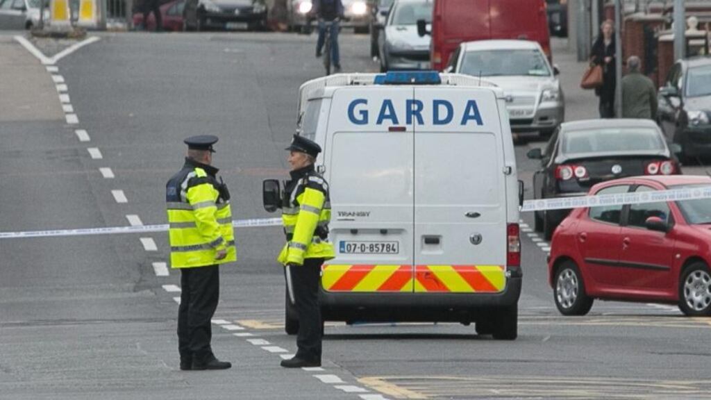 Gardai at Portland Row close to the scene of a fatal shooting on Empress Place in Dublin. Photograph: Gareth Chaney/Collins