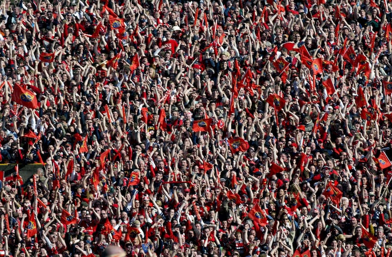 Munster fans celebrate the win over Leinster in the Heineken Cup semi-final at the Aviva Stadium in April 2006. Photograph: Dan Sheridan/Inpho