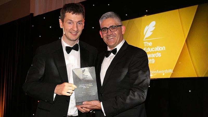 Donal McAlister, International Education Specialist presents the Best Use of Educational Technology/ICT Initiative of the Year to Dr Cormac Quigley, Galway-Mayo Institute of Technology
