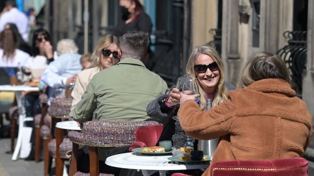 People enjoying the May bank holiday as Covid restrictions were lifted in Belfast: ‘We will look at a variety of mechanisms that we could deploy to assist the hospitality sector,’ Martin said. File photograph: Charles McQuillan/ Getty
