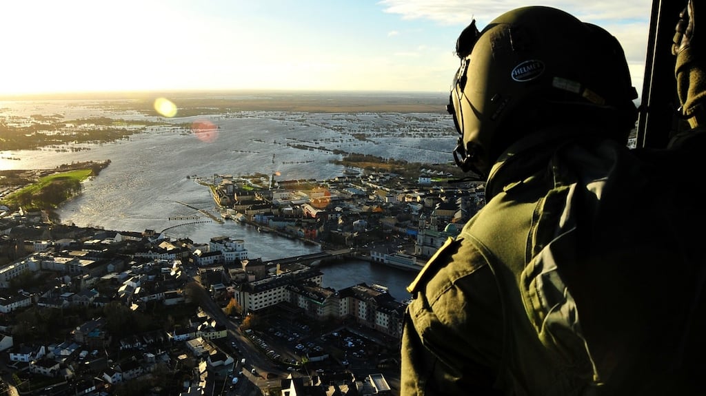 A swollen River Shannon in Athlone after Storm Desmond hit the area earlier in December 2015. File photograph: Airman Jamie Martin/Air Corps/PA Wire