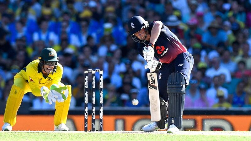 Jos Buttler plays a shot into the off side during his century in Sydney. Photograph: Bradley Kanaris/Getty