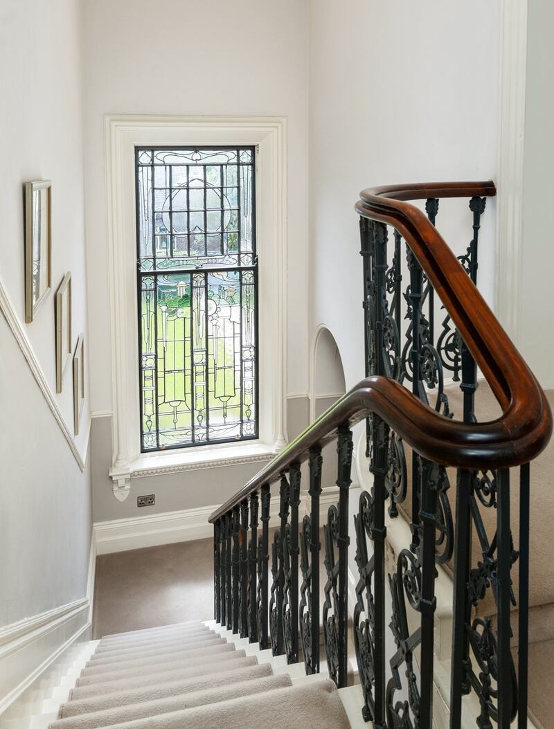 Decorative leaded glass window on the stairwell
