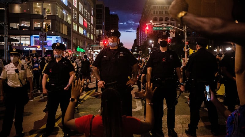 Police and protesters in New York. Photograph:Gabriela Bhaskar/The New York Times