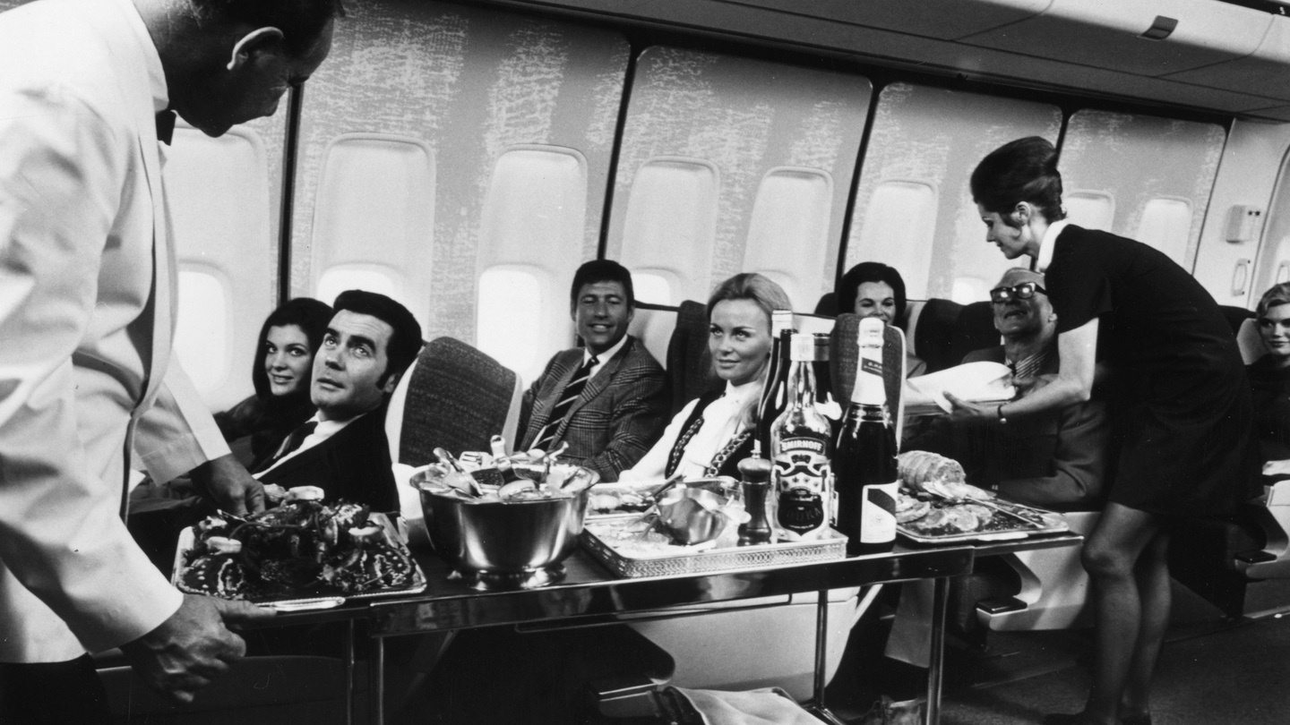 In-flight snacks were once provided for free, perhaps to distract us from our surroundings. Photograph: Fox Photos/Getty Images