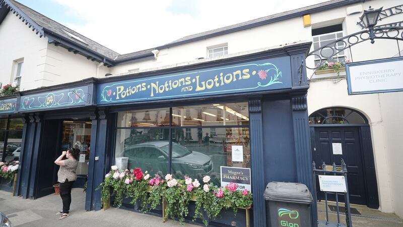 The local chemist in Enniskerry has been  renamed The Village Cauldron, Potions, Notions and Lotions, for the filming of Disenchanted. Photograph: Niall Carson/PA Wire