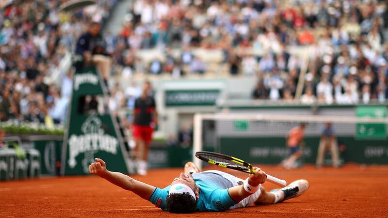 Cecchinato celebrates after his win. Photo: Cameron Spencer/Getty Images