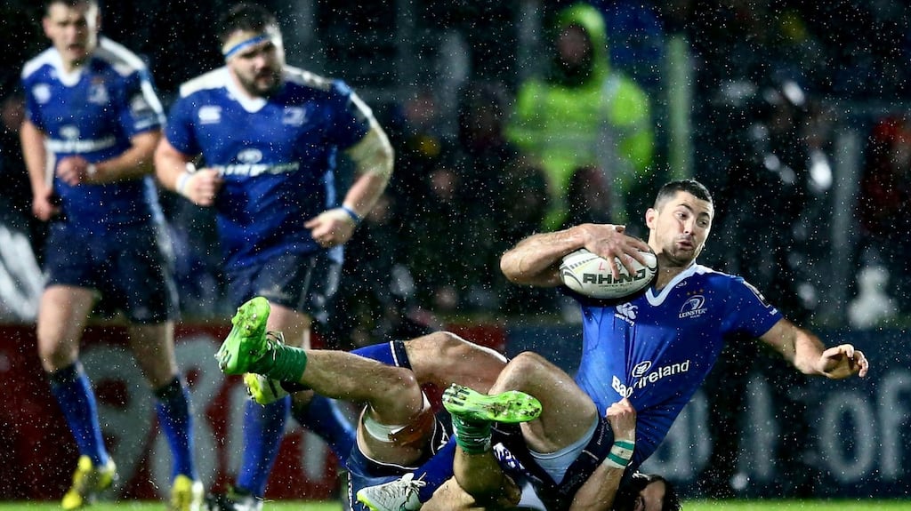 Rob Kearney is tackled by Tiernan O’Halloran during Leinster’s 13-0 win at a sodden RDS on Friday. Photograph: Inpho