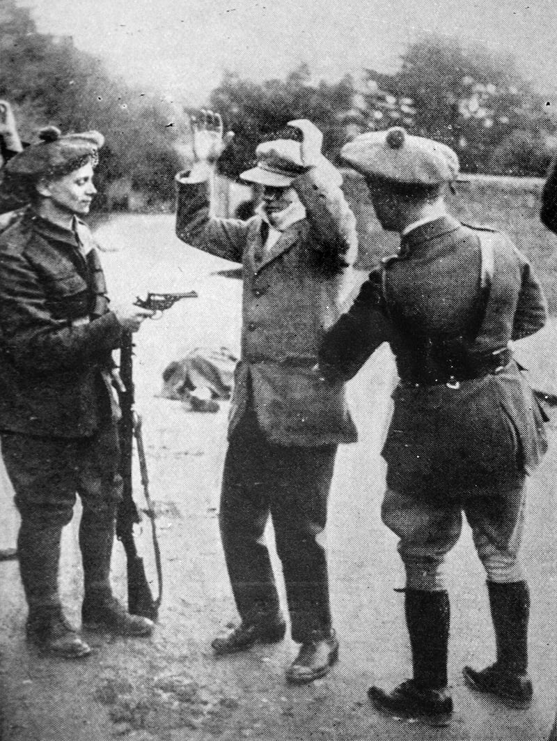 The caption on this photograph published in the Graphic read: “searching a rebel prisoner taken in a fight at Tralee”