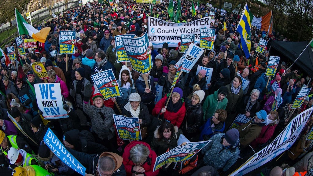 Implacable opposition: water-charge protesters outside Leinster House in December 2014. Photograph: Cathal Noonan/ Anadolu Agency/Getty Images)