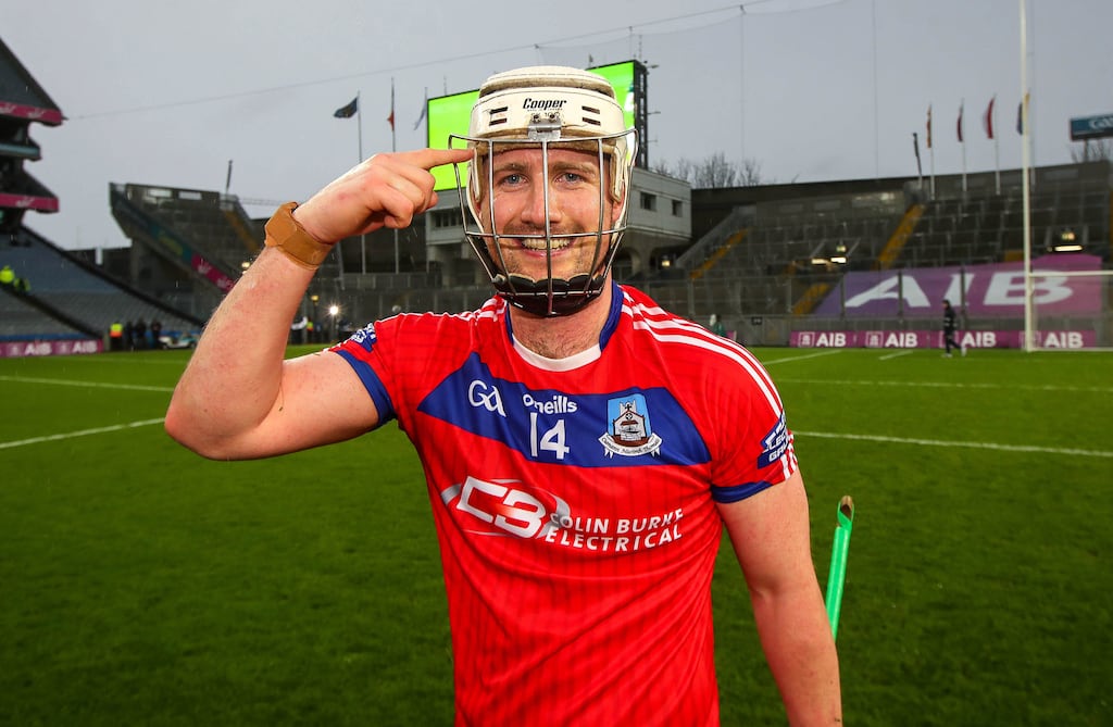 St. Thomas’ Éanna Burke celebrates after the game and hitting the game winning point. Photograph: Ryan Byrne/Inpho