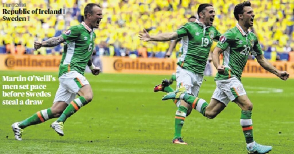 Wes Hoolahan (right) celebrates with midfielder Glenn Whelan and Robbie Brady after scoring Ireland's goal at the Stade de France. Photograph: Miguel Medina/Getty