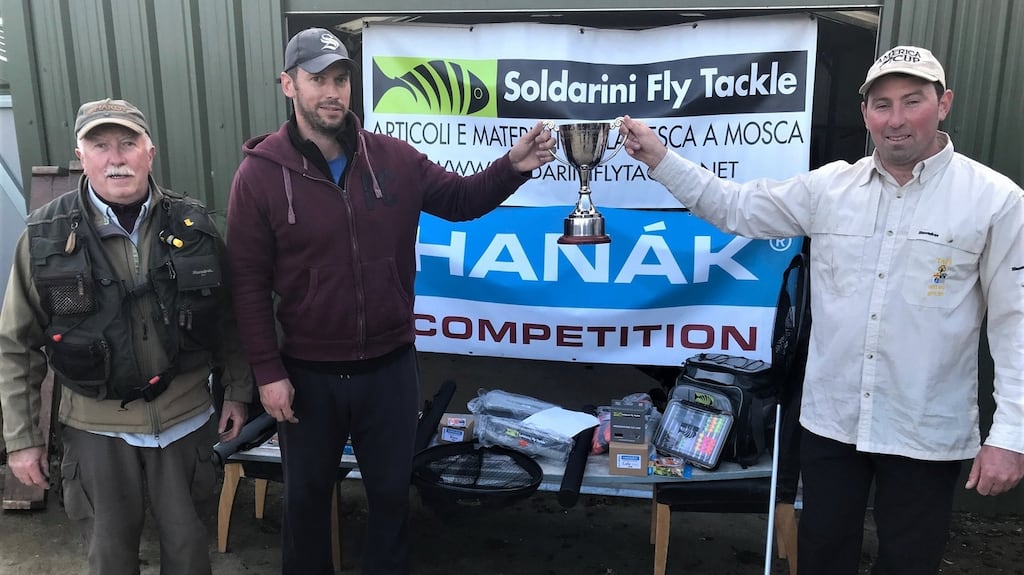Brian Brennan (second left), winner of the Knockaderry Cup receiving the cup from Waterford Trout Anglers’ Association member, Michael Drinan, with club chairman, William Hanrahan