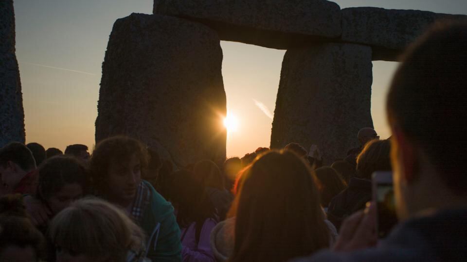 The sun rises over Stonehenge on Salisbury Plain in southern England. Photograph: Kieran Doherty/Reuters
