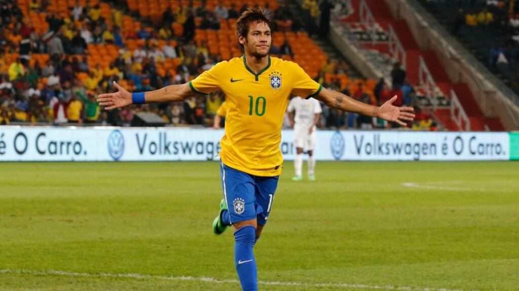 Brazil’s Neymar celebrates the first goal of his hat-trick in the international friendly against South Africa during their international friendly at Soccer City in Johannesburg. Photograph: Siphiwe Sibeko/Reuters