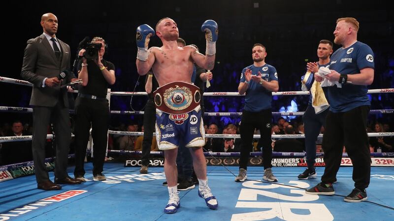 Carl Frampton celebrates winning the WBO Interim World Featherweight Championship Bout against Nonito Donaire. Photograph: Brian Lawless/PA Wire.