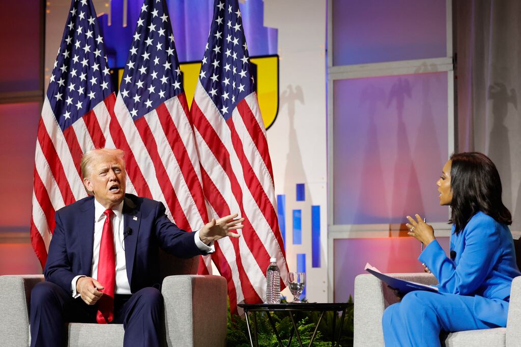 Former US president and 2024 Republican presidential nominee Donald Trump answers questions from moderator and journalist Rachel Scott at the National Association of Black Journalists’ annual convention. Photograph: Kamil Krzaczynski/Getty