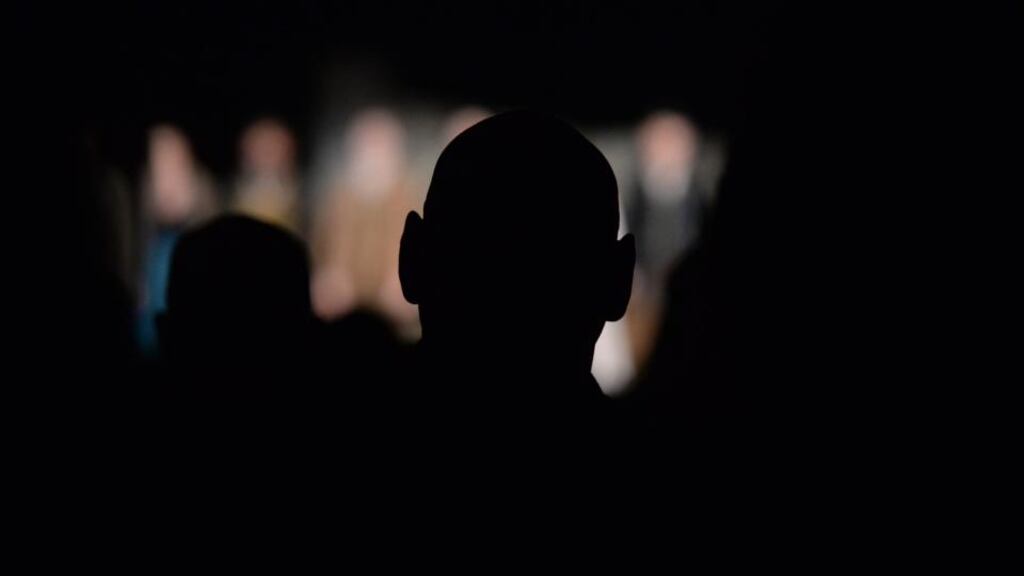 ‘The assembly hall could fit less than half the prison population, so inmates had to be invited, mostly from the music or other classes.’ Above, inmates at Wheatfield prison watch the Abbey Theatre’s performance of The Risen People by James Plunkett adapted by Jimmy Fay. Photograph: Dara Mac Dónaill