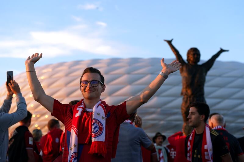 Bayern Munich fans next to the Gerd Muller statue outside the stadium ahead of the UEFA Champions League against Manchester United at the Allianz Arena. Kane is now being compared to the legendary Bayern and Germany striker. Photograph: Nick Potts/PA Wire