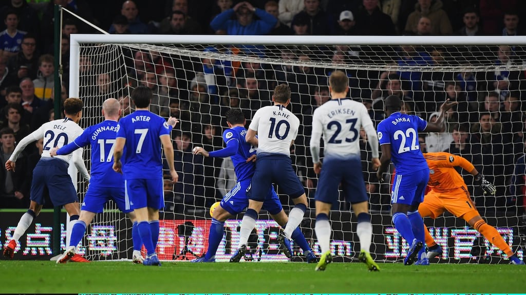 Harry Kane bundles home Tottenham’s early opener against Cardiff. Photograph: Stu Forster/Getty