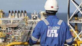 Tullow Oil downgrades output guidance again as it restores dividend