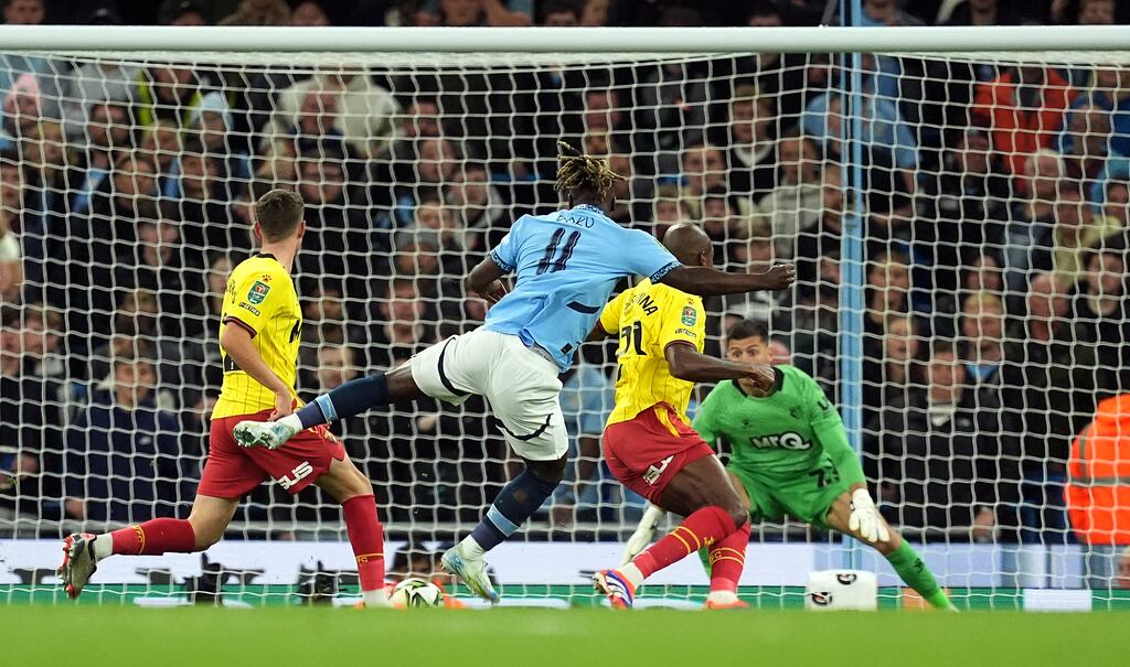 Manchester City's Jeremy Doku scores their side's first goal of the game during the Carabao Cup third round match at the Etihad Stadium, Manchester. Photograph: Martin Rickett/PA Wire