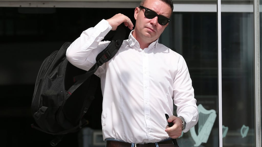 Karl Sutton (33), Crumlin Park, Crumlin, leaves Dublin Circuit Criminal Court after receiving a four-year suspended sentence for assault causing harm to his then girlfriend, Tiffany Curtis, at their flat in Rialto in 2003. Photograph: Collins Courts.