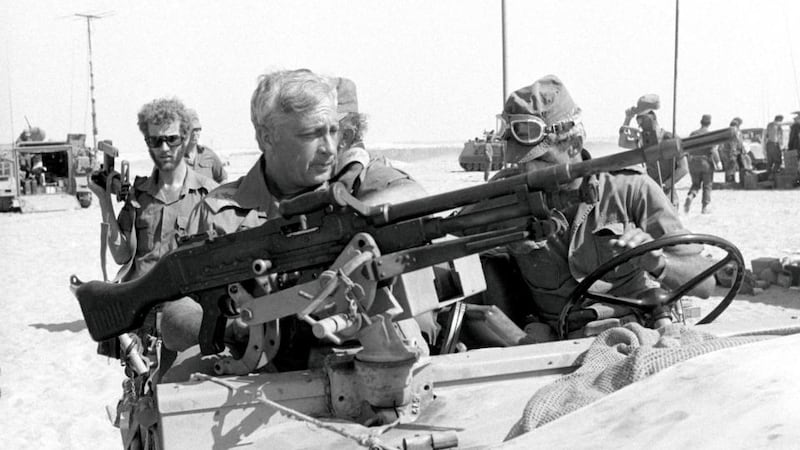 Major General Ariel Sharon rides in a military vehicle in 1973. File Photograph: Israel’s Defence Ministry/Reuters