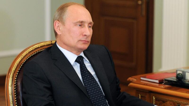 Russian president Vladimir Putin attends his working meeting yesterday. Russia will ban all imports of food from the United States and all fruit and vegetables from Europe. Photograph: Mikhail Klimentiev/EPA/Kremlin Pool