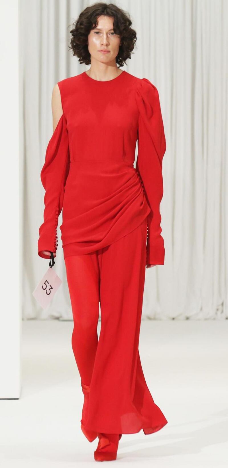 Top-to-toe red dress by Magda Butryn with red, tights and shoes