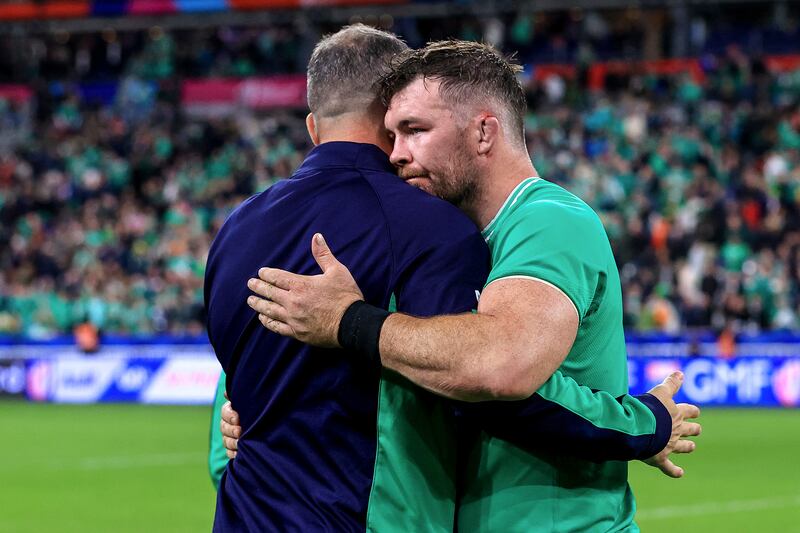 Ireland's head coach Andy Farrell and Peter O'Mahony console each other following the heartbreaking World Cup quarter-final defeat at the Stade de France. Photograph: Dan Sheridan/Inpho