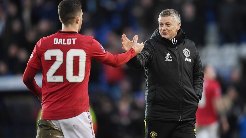 Ole Gunnar Solskjaer with goalscorer Diogo Dalot after Manchester United’s win at Tranmere. Photograph: Gareth Copley/Getty