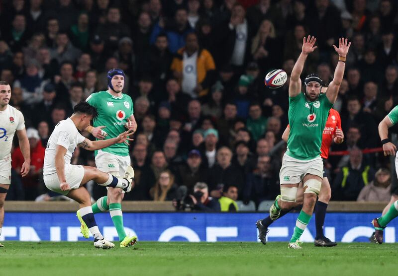 England’s Marcus Smith kicks a drop goal to win the game against Ireland. Photograph: Andrew Fosker/Inpho