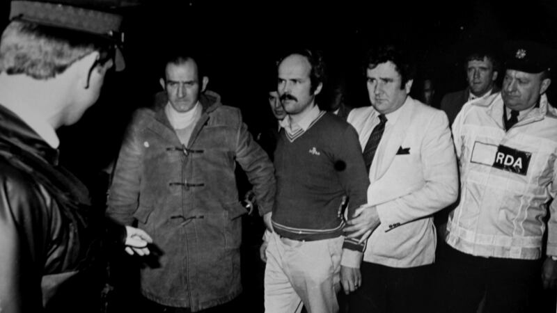 Following a shoot-out with gardaí Dominic McGlinchey is handed over to the RUC at the border near Carrickdale outside Dundalk. Photograph: Tom Burke/ Independent News And Media/ Getty Images