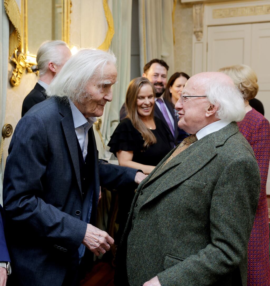 Fritz Senn is greeted by President Michael D Higgins on the conferring of his award for distinguished service to Ireland overseas at Áras an Uachtaráin in January. Photograph: Courtesy of Áras an Uachtaráin