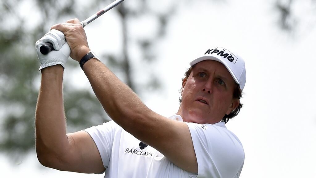 US golfer Phil Mickelson: According to the Securities and Exchange Commission,   leading   sports-betting industry figure William “Billy” Walters urged Mr Mickelson  to buy shares in Dean Foods ahead of a spin-off. Photograph:  Nicholas Kamm/AFP/Getty Images