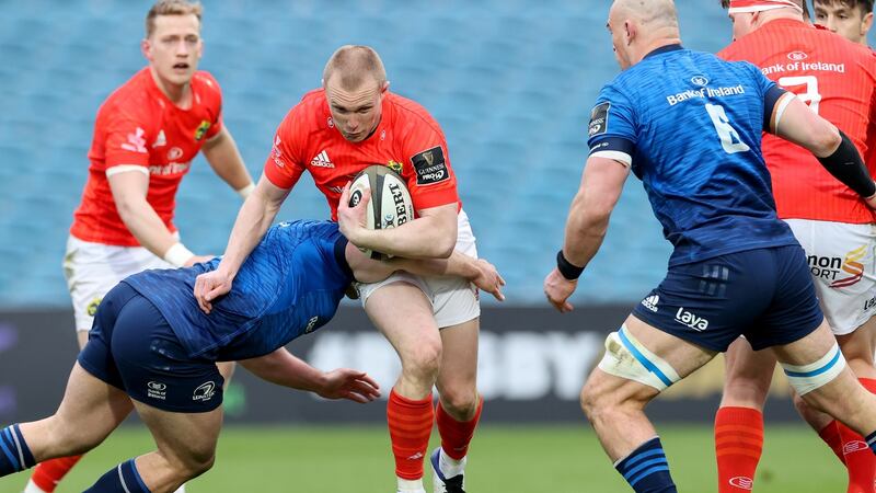 Keith Earls is shackled during Munster’s Pro14 final defeat to Leinster. Photograph: Billy Stickland/Inpho