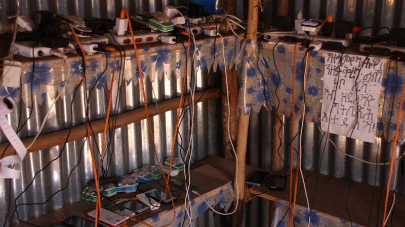 A small shack in Hitsats camp that recharges mobiles for one Ethiopian birr (€0.04) a charge. Photograph: James Jeffrey