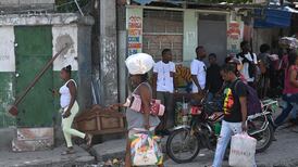 Haiti aid groups halt operations as thousands flee gang warfare