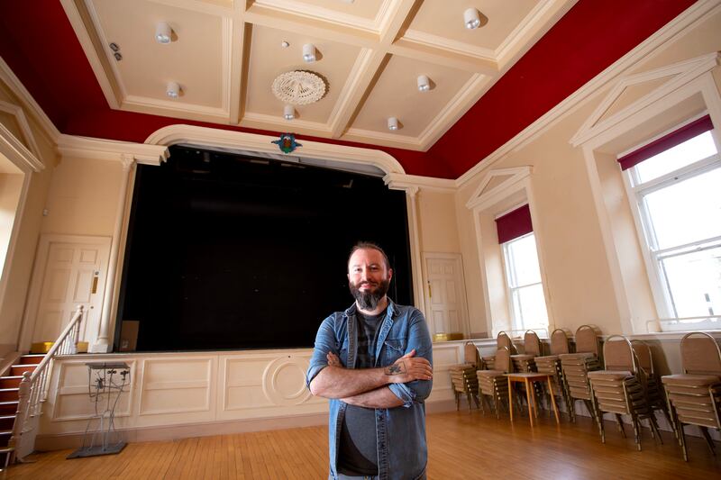 Emmet Lawlor in the Athenaeum. Lawlor now works in Enniscorthy Castle as a guide and was 24 when the movie was made. He was cast as one of the six rugby club extras. Photograph: Mary Browne