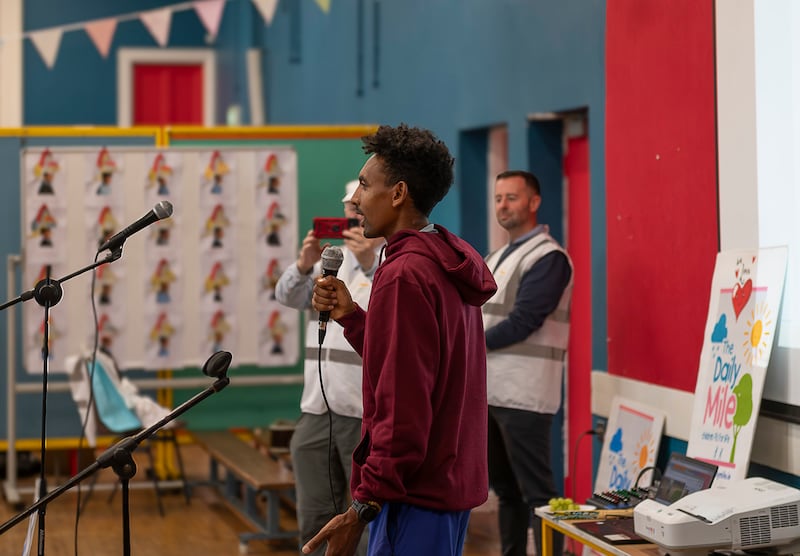 Efrem Gidey addresses pupils from Scoil Mhuire Gan Smál in Inchicore as part of The Daily Mile campaign. Photograph: Ciarán Conlan