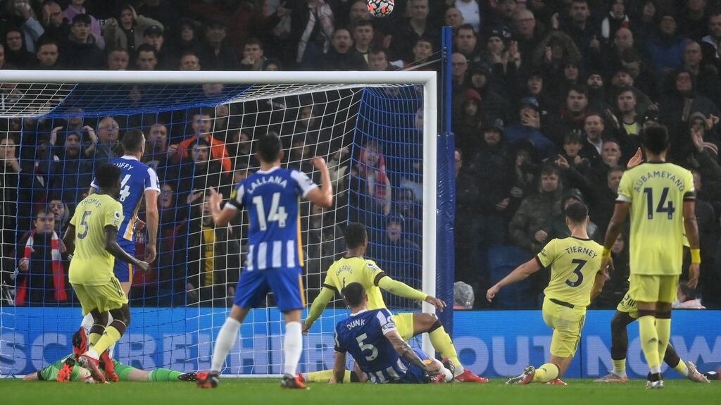 Lewis Dunk of Brighton & Hove Albion misses a chance during the Premier League match against Arsenal. Photo: Mike Hewitt/Getty Images