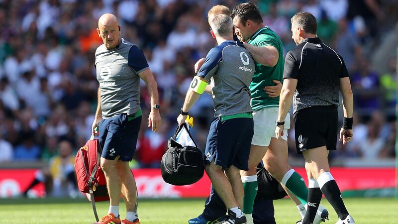 Cian Healy limps off during Ireland’s heavy defeat at Twickenham. Photograph: Warren Little/Getty
