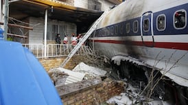 Fifteen killed as plane crashes into residential housing in Iran